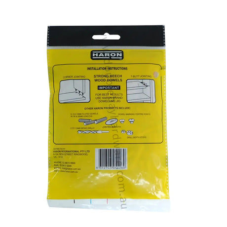 Yellow package with black lid containing Haron brand wood dowels on a white background