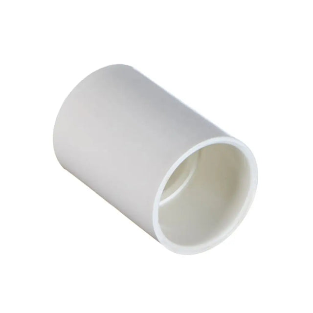 White PVC pipe fitting on a white background