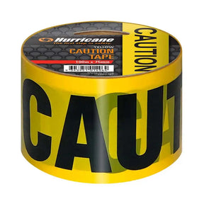 Roll of yellow caution tape with black text on a white background