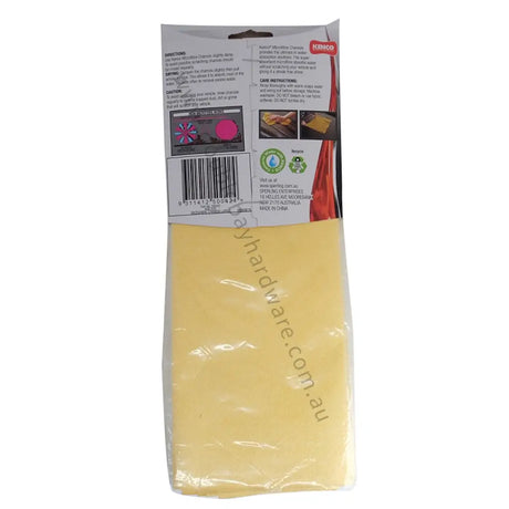 Yellow towel in a clear package with a visible brand label on a white background