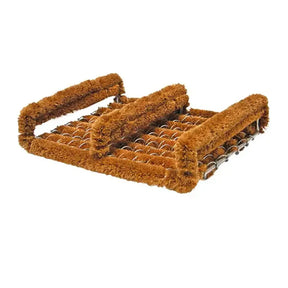 Dog toy with corrugated metal and brown textured surface on a white background