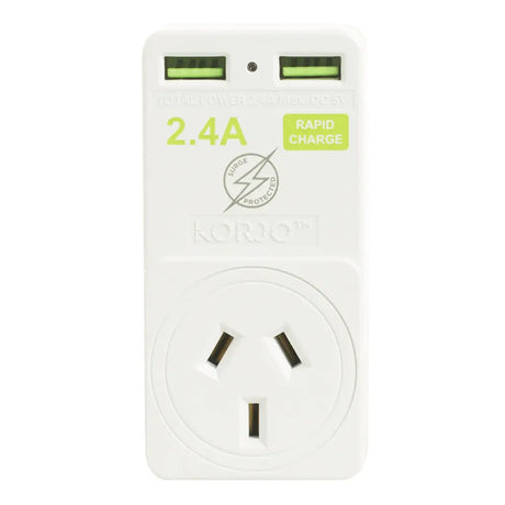 White charging adapter with two USB ports and a socket on a white background