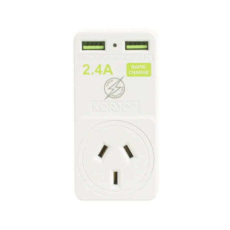 White travel adapter with USB ports and socket on a white background