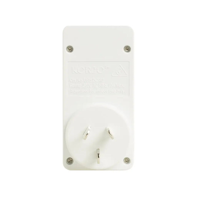 White wall socket with three outlets on a white background