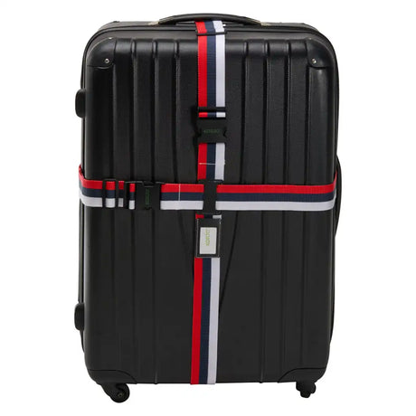 Black suitcase with a colorful strap on a white background
