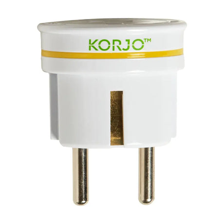 White travel adapter with 'KORJO' branding on a white background