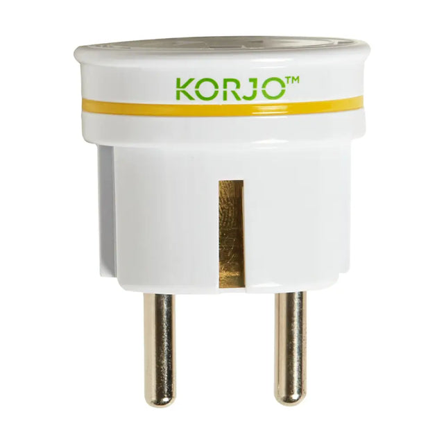 White travel adapter with 'KORJO' branding on a white background