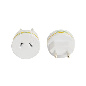 Two white travel adapters with gold accents on a white background, branded 'Korjo'.