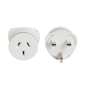 Two white travel plugs on a white background