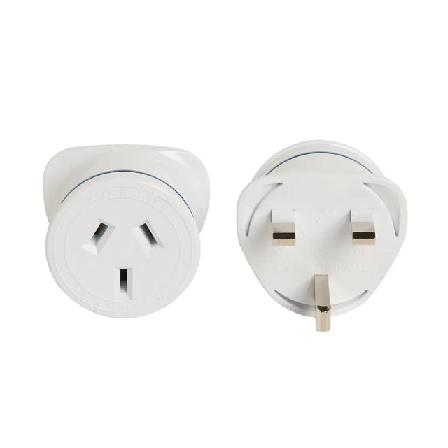 Two white travel plugs on a white background