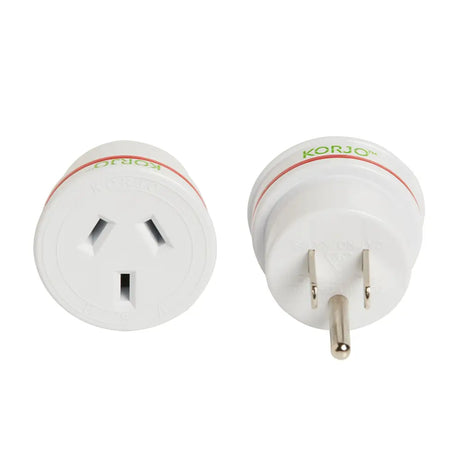 Two white travel adapters with 'Korjo' branding on a white background