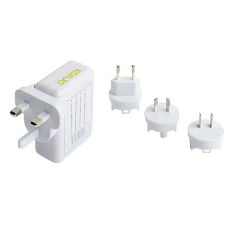 Set of travel adapters on a white background