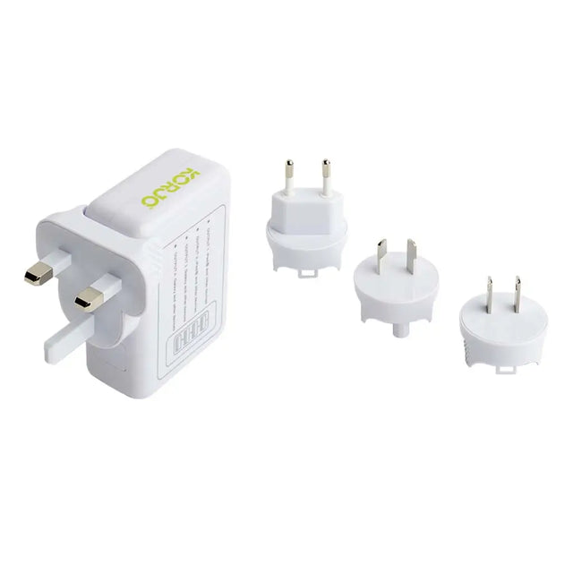 Set of travel adapters on a white background