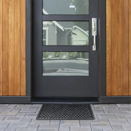 Modern black door with glass panels on a wooden house exterior