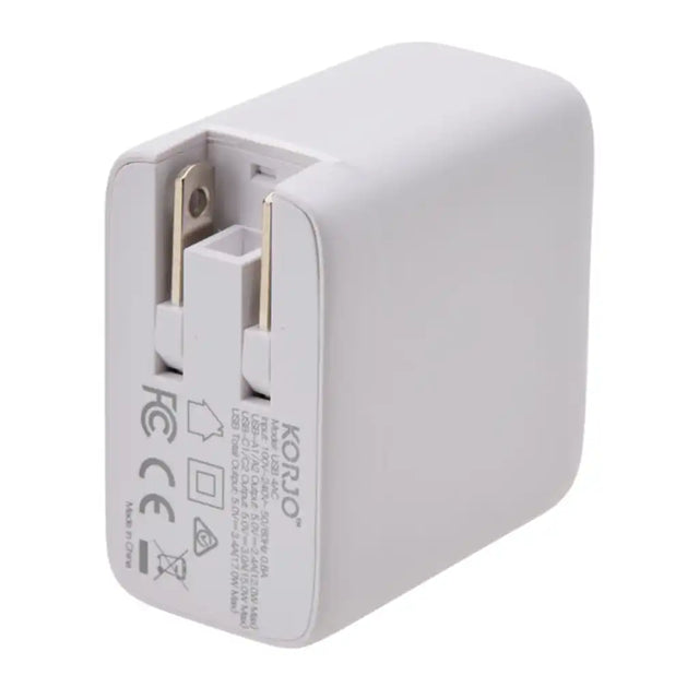 Korjo USB-A & USB-C 4 Port Power Hub side view with US plug attached and compliance markings