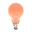 Peach-colored light bulb on a white background