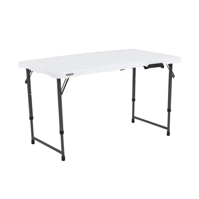 White folding table with black legs on a white background