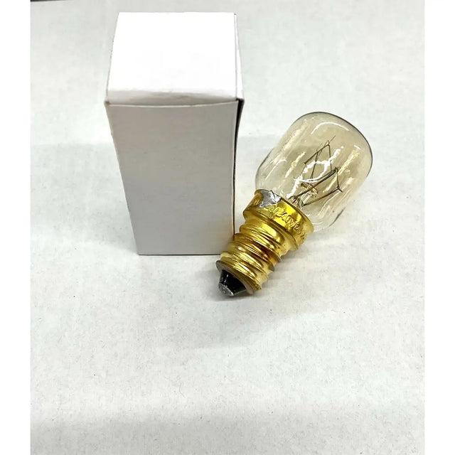 Clear light bulb with gold base on a white background