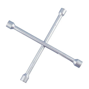 Two crossed metal wrenches on a white background