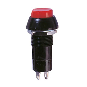 Black push button switch with red cap on a white background