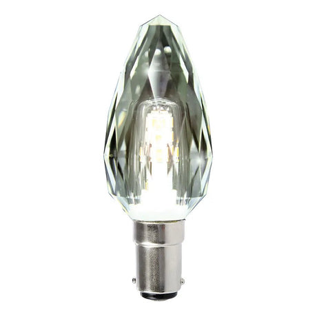 Clear LED light bulb with decorative base on a white background