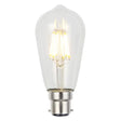 Clear light bulb with visible filament on a white background