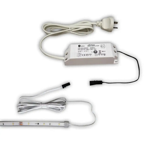 LED strip light with power adapter and cable on a white background