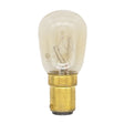 Clear light bulb with brass base on a white background