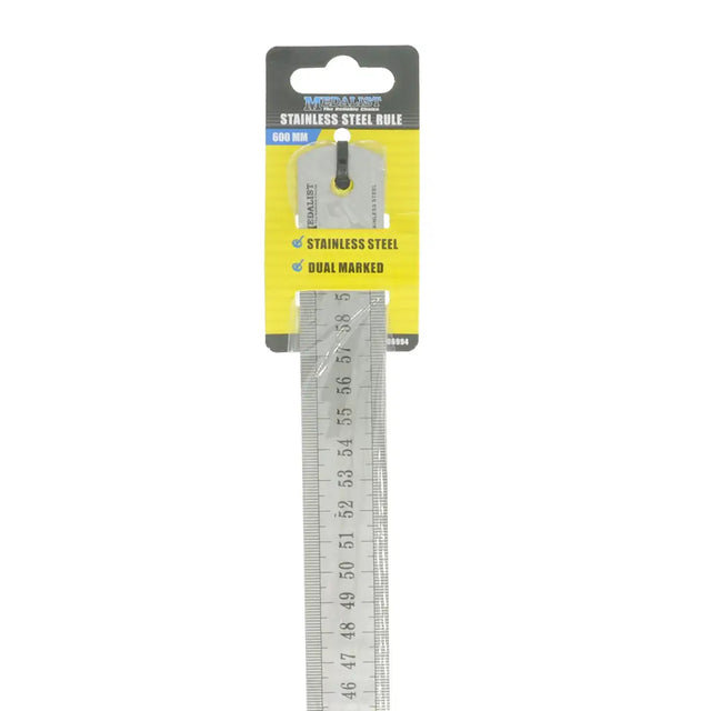 Metal ruler with a yellow and black packaging label on a white background