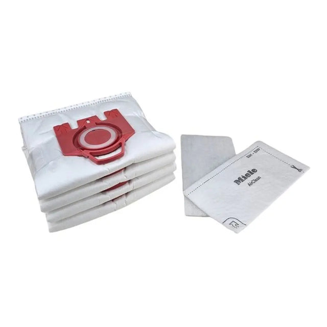 Stack of white vacuum bags with a red valve on a white background