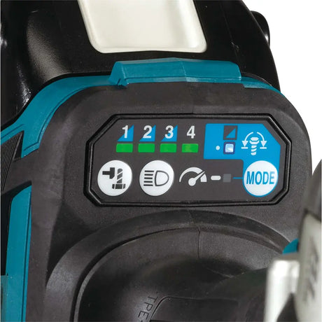 Close-up of a cordless power tool control panel with a teal and black housing, showing mode indicators and buttons.