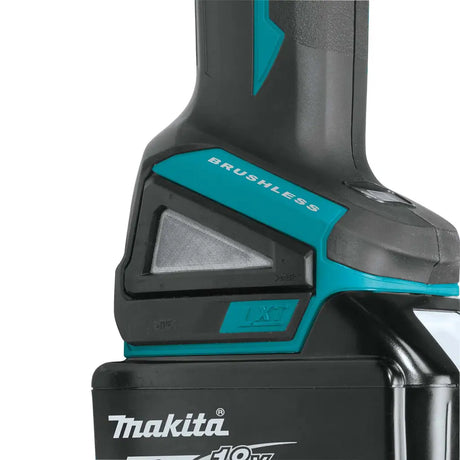 Close-up of a Makita cordless power tool showing the battery pack, brushless motor housing, and part of the handle on a white background.