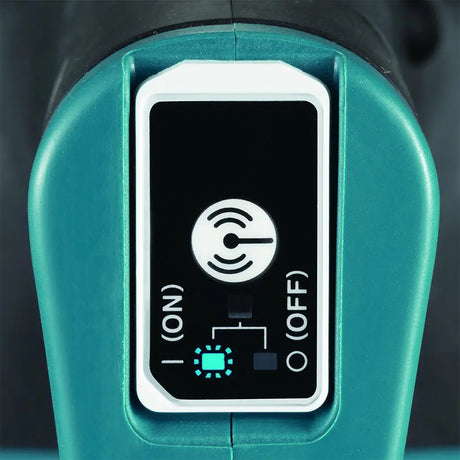 Close-up of a teal handheld device control panel with a black faceplate, white switch markings labeled ON and OFF, and a glowing blue indicator light.