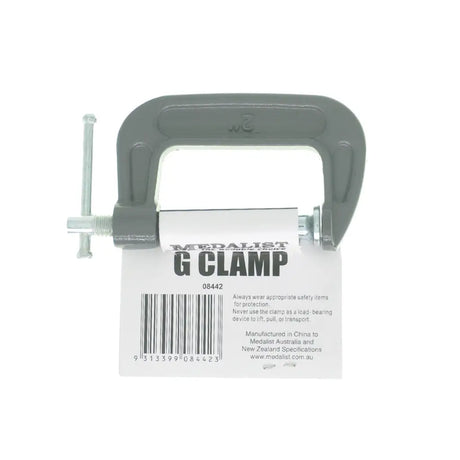 G clamp with a label on a white background