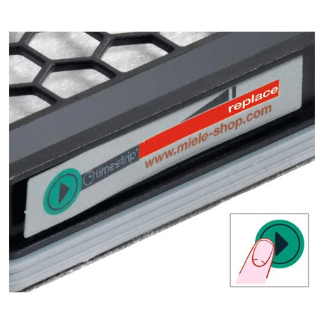 Miele filter with 'replace' label and website URL on a white background
