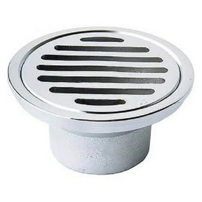 Round metal drain cover on a white background