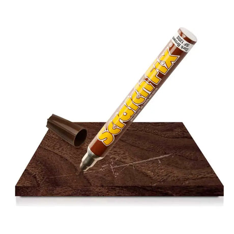 Scratch Fix pen on a wooden surface with a scratch repaired.
