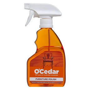 O'Cedar furniture polish spray bottle on a white background