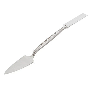 Metal spatula on a white background