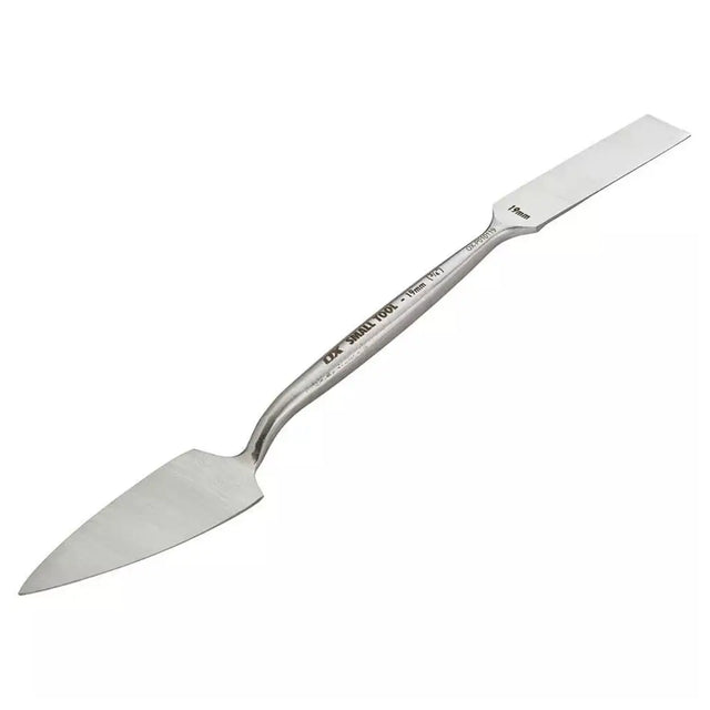 Metal spatula on a white background