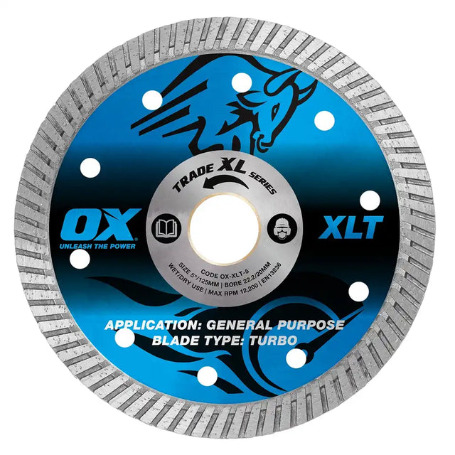 A circular diamond wet saw blade with a blue and black printed center label and a silver-gray abrasive outer rim, shown on a plain white background. Visible text includes 'OX', 'XLT', 'TRADE XL SERIES', and 'APPLICATION: GENERAL PURPOSE BLADE TYPE: TURBO'.