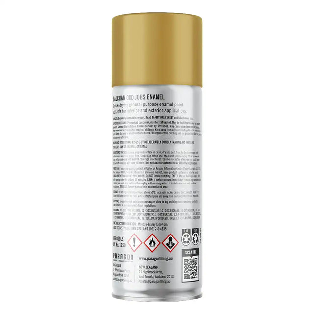 Gold spray paint can with label on a white background