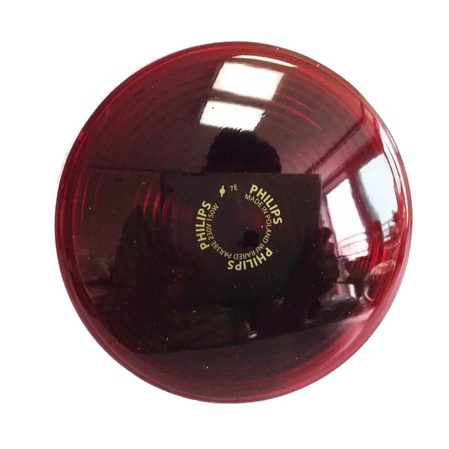 Red round light with Philips branding on a white background