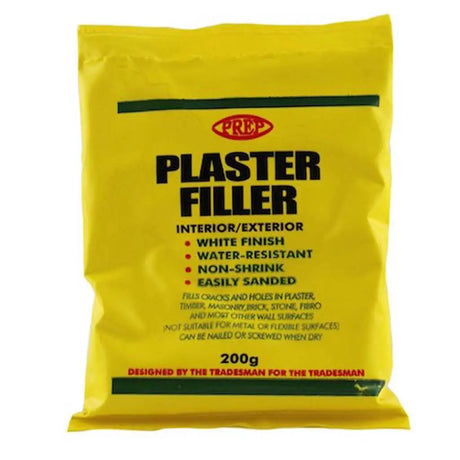 Yellow package of plaster filler with black text on a white background