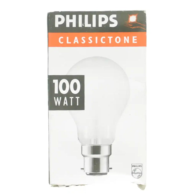 English-labelled box front: Philips GLS B22 230V 100W warm white incandescent light bulb Classictone packaging showing bulb illustration and 100 WATT label on white background