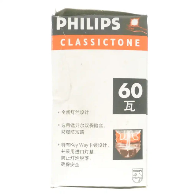 Philips Classic Tone 60 watt light bulb packaging on a white background
