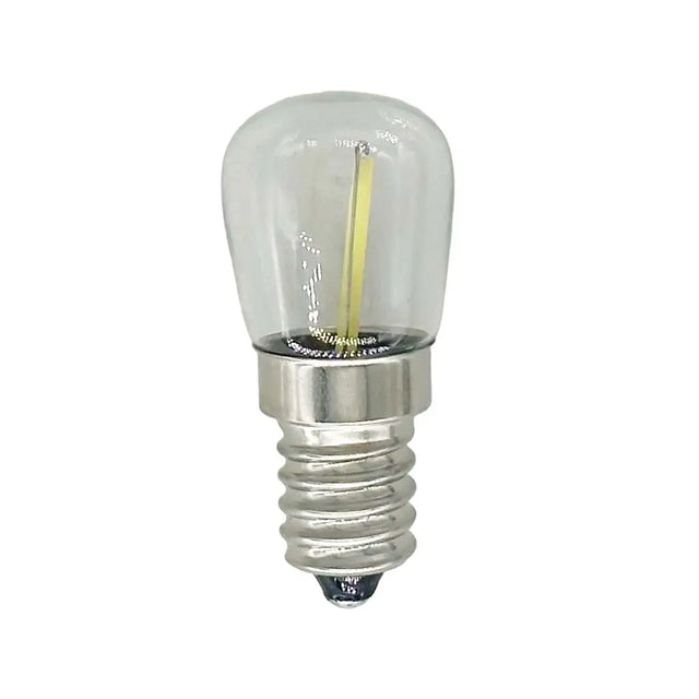Clear light bulb with silver base on a white background