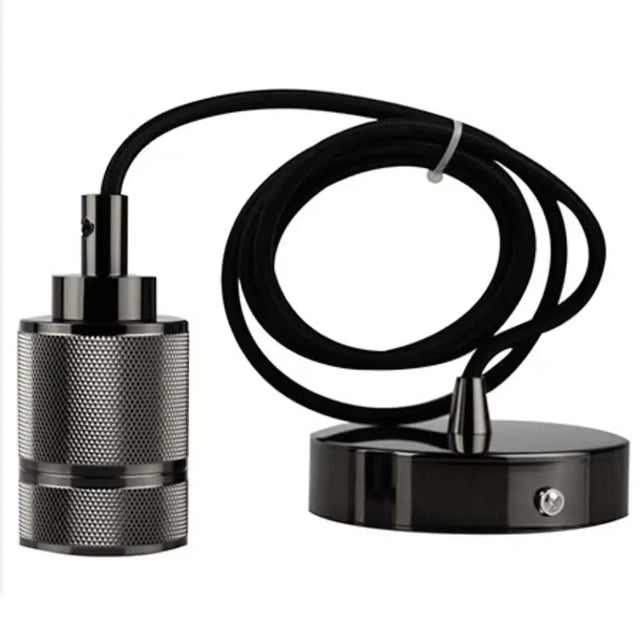 Black metal lamp components with coiled cable on a white background