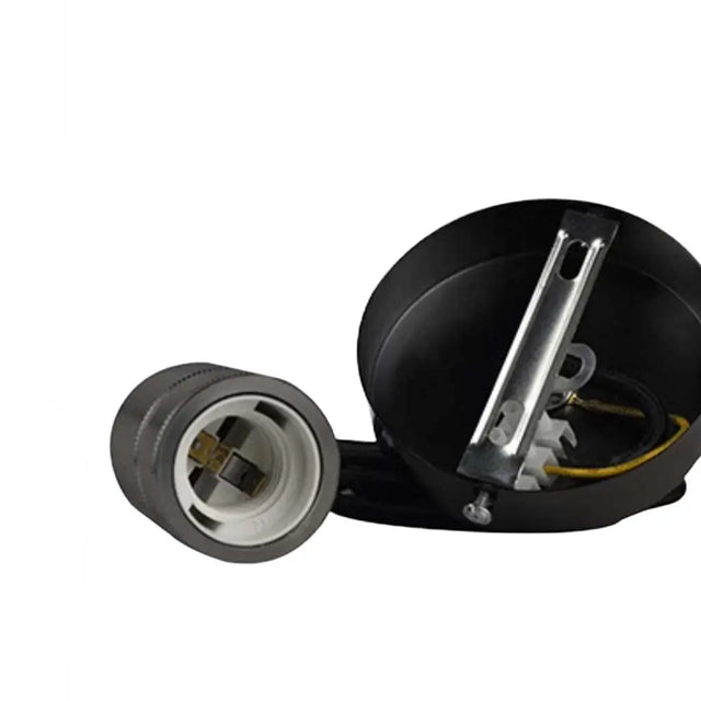 Mechanical component with black housing and metallic parts on a white background