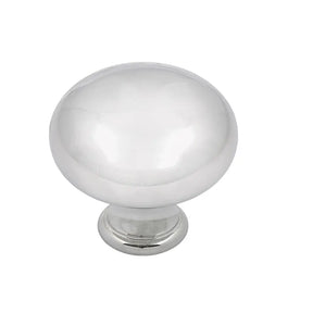 Polished chrome cabinet knob on a white background